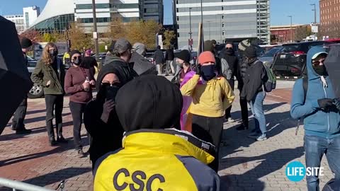 Antifa thugs verbally assault Fr. James Altman, LifeSite journalist outside bishops' meeting