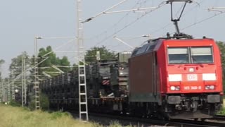 DB Cargo AG with 185 368-8 pulls a military train