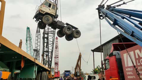 Big Lorry Lifting And Carrying By Wrecker