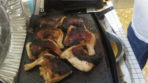 Chicken quarters on the E-Griddle Flat-top Grill