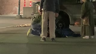 Woman Stuck Under Truck Tire After Car Park Collision