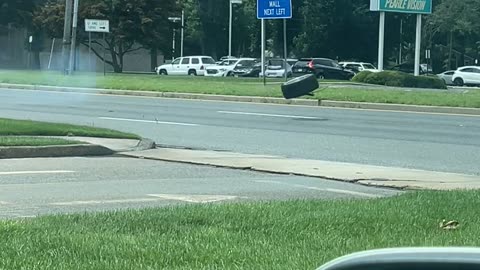 Wheel on the Loose Crashes Into Car