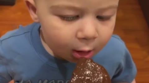Baby Boy eats chocolate
