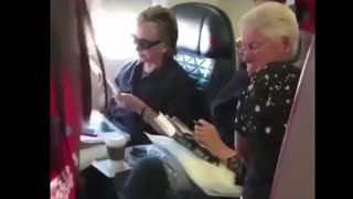 Clinton’s on commercial flight