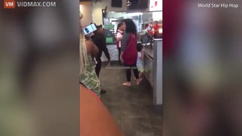 'Furious' customer ATTACKS woman carrying a child in McDonald's