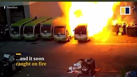 Moment Electric bus catches fire on it's own and destroys more around it.