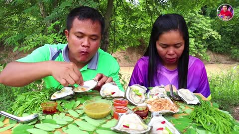 Thai uncle eats seafood