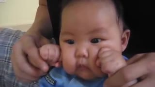 Cute Baby Works On His Right Hook With A Little Help From His Uncle