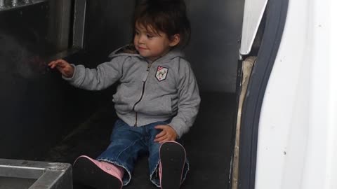 2-year-old examines Border Patrol K-9 truck