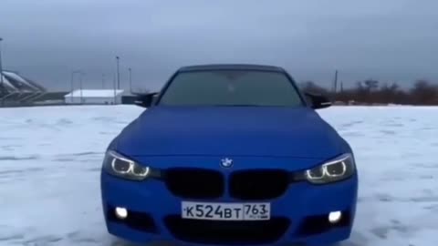 Bmw car driving in snow