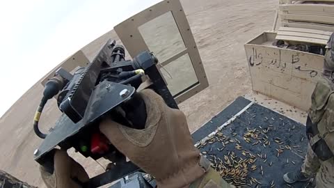 Military soldier having fun with Mini-Gun