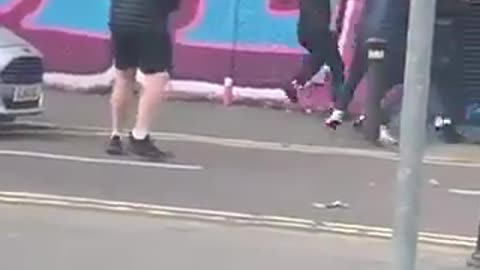 ⚠️Belfast, Ireland🇮🇪 Muslim attacking kids outside shops on The Falls Road.