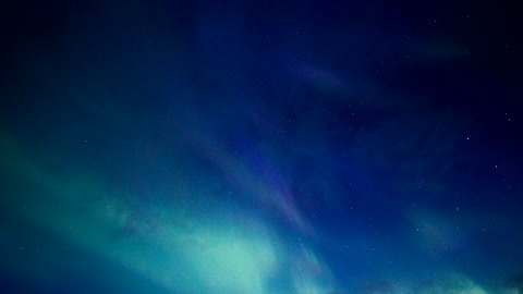 Northern Lights of blue and green colors in the night sky