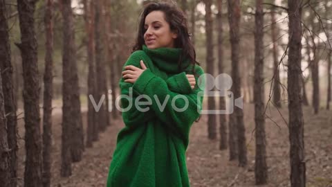 Cheerful Beautiful Woman Alone In The Forest Enjoying Freedom Walking Towards The Camera