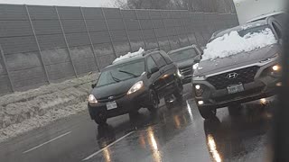 Woman Drives with Snow Completely Covering Windshield