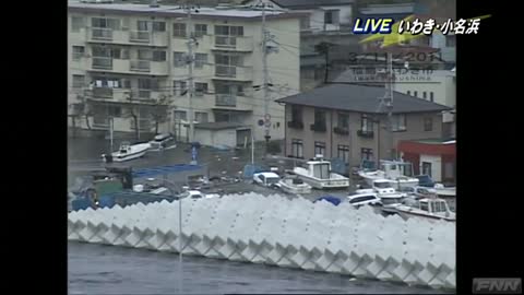 Ocean Overtops Wall - Japan Tsunami