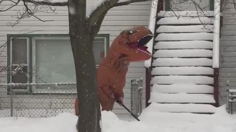 T-Rex Shovelling Snow