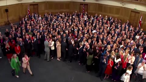 UK's new PM Starmer poses with Labour lawmakers