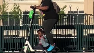 Lady on Scooter Loses Her Child