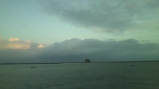 Filming a small island in the middle of the sea at dusk, near of the rocks! [Nature & Animals]