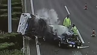 Traffic Cop At Accident Site Dodges Crashing Car