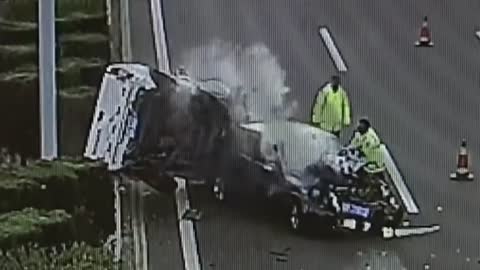 Traffic Cop At Accident Site Dodges Crashing Car