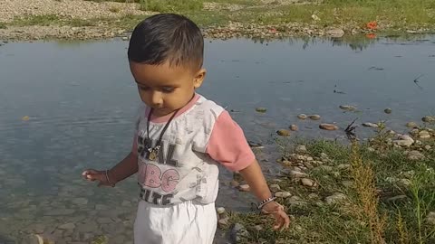 Kid playing water