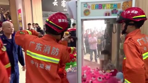 Curious Boy Traps Himself Among Toys Inside Claw Machine