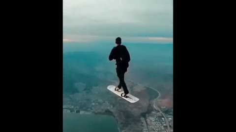 A Man Demonstrating a Sky Surfing Caught on Cam.