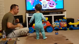Dad constructs dance floor for baby to dance to 'baby shark'