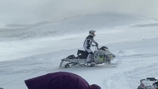 Snowmobiling Climb Sets off Avalanche