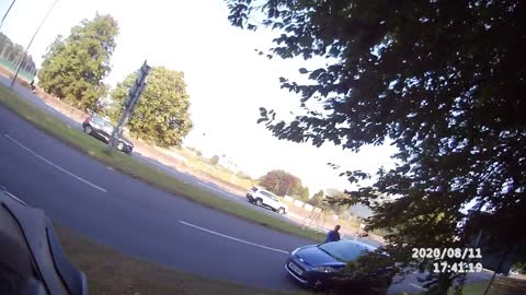 Cyclist and Driver Have Roadside Altercation over Close Pass