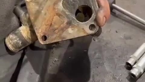 The small parts in the car engine are removed