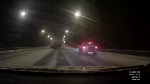 Truck Slides Out On Icy Highway