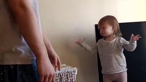 Adorable daddy/daughter standoff