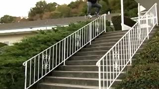 Terrible skateboard rail slide leads to slam