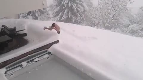 Daredevil enjoys heavy snowfall in best possible way