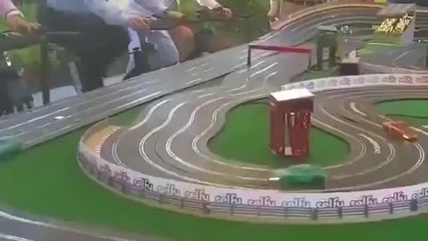 Crazy slot car race powered by bicycles