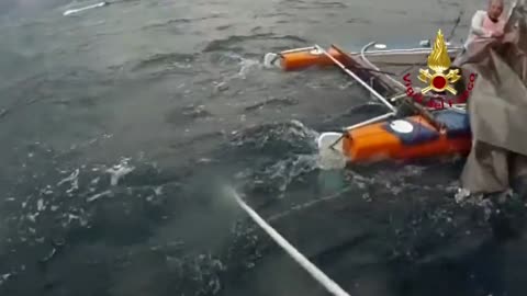 Coastguard in Italy Rescues Two After Catamaran Overturned