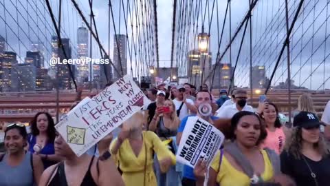Protesters on mandatory vaccinations chant "F*** Joe Biden" in New York City.