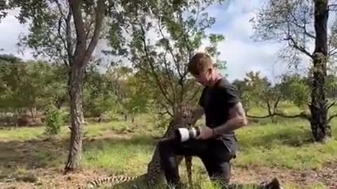 A photographer and a cheetah