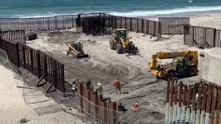 SAN DIEGO: Illegal immigrants run into the U.S. as construction is done on border barriers.