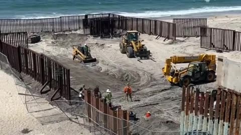 SAN DIEGO: Illegal immigrants run into the U.S. as construction is done on border barriers.