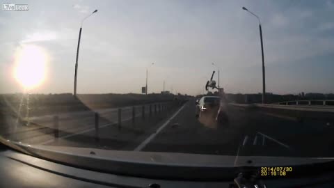 Amazing motorcycle accident lands safely