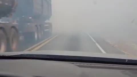 Wildfire Smoke Suddenly Lower Visibility on Road