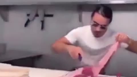 Man flings meat at child