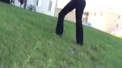 Girl black clothes backflip grass fail