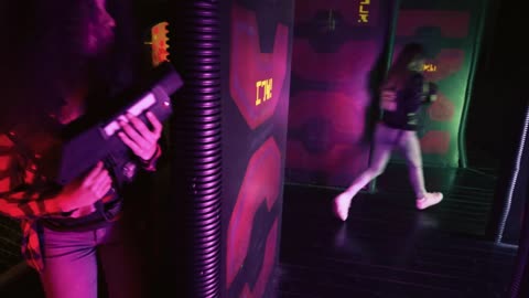 Group of friends playing laser tag
