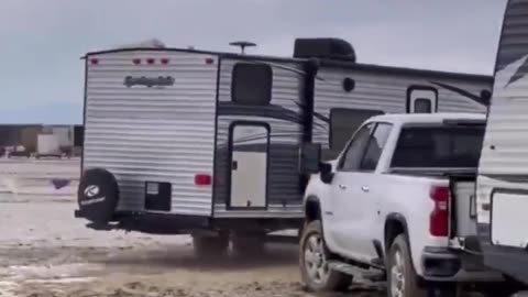 People test their cars at the Burning Man to see how they fair.