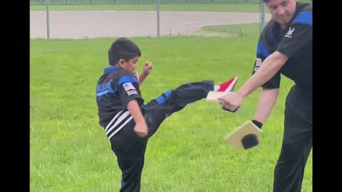 Board break with round house kick.